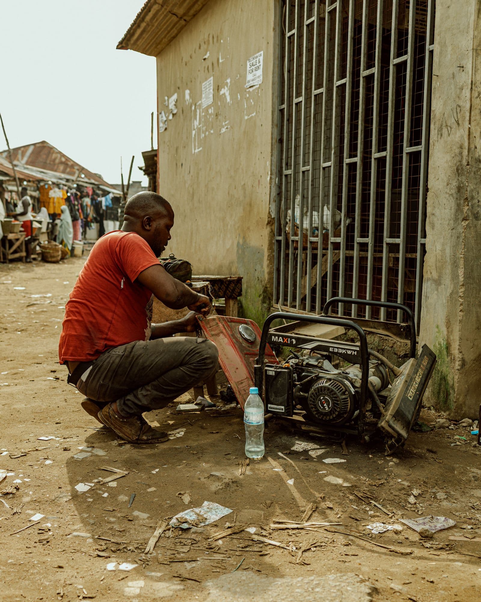 Technician repairing a portable generator