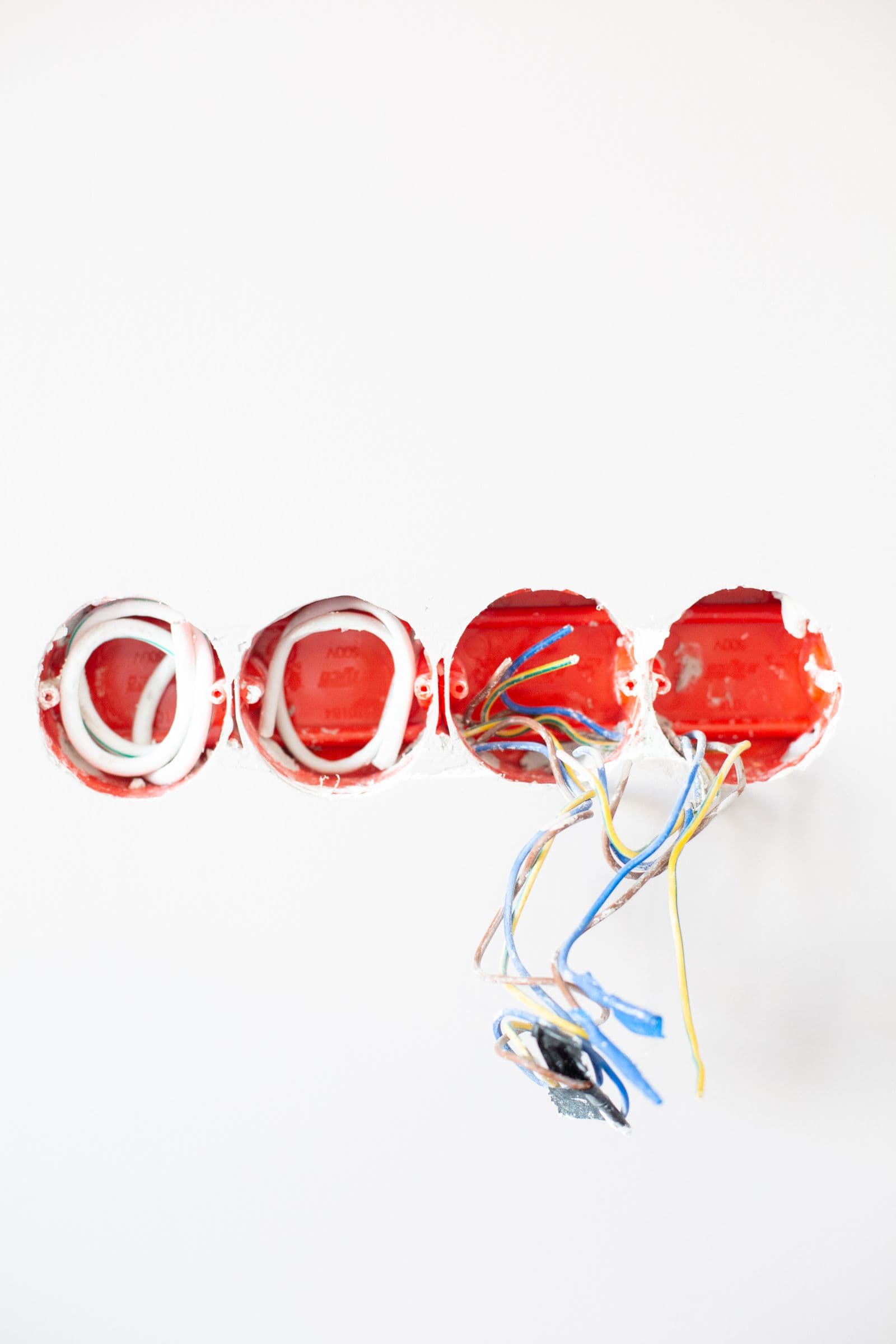 Exposed electrical wiring prepared inside a home wall